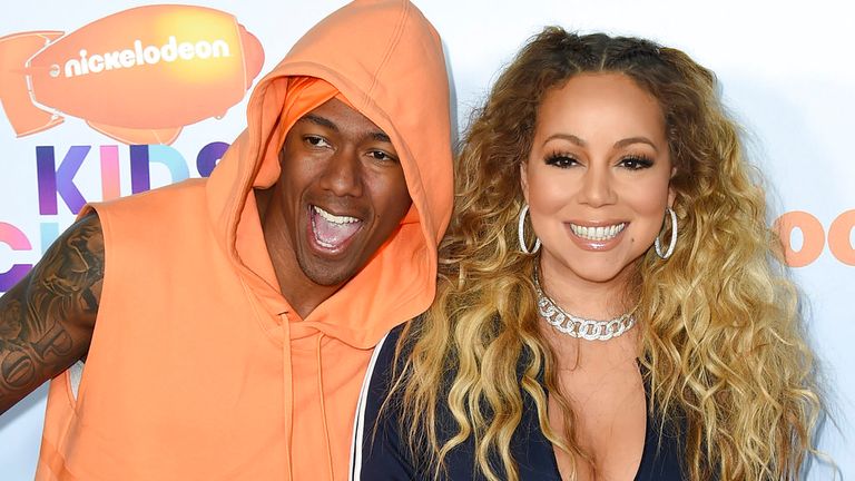 Nick Cannon, a la izquierda, y Mariah Carey llegan a Kids'  Choice Awards en el Galen Center el sábado 11 de marzo de 2017 en Los Ángeles.  (Foto de Jordan Strauss/Invision/Associated Press)