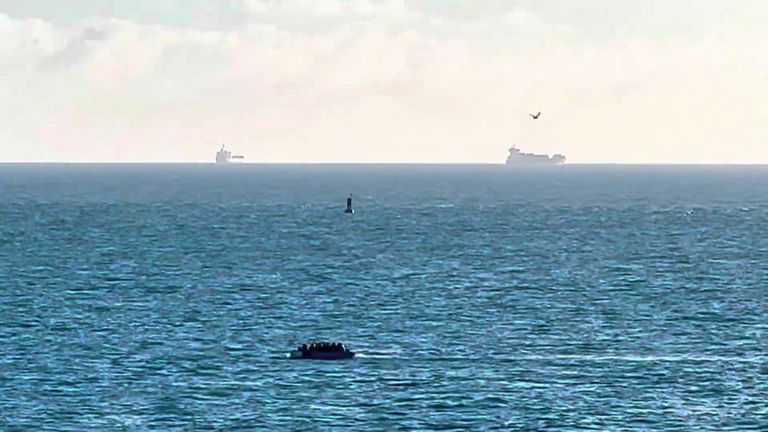 A migrant boat has been filmed crossing the Channel about a mile out from Calais.