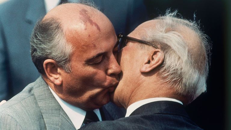 FILE - In this Wednesday, May 27, 1987, file photo, Soviet Communist Party leader Mikhail Gorbachev, left, and East German State and Communist Party leader Erich Honecker exchange kisses at Schoenefeld Airport in East Berlin.  Gorbachev encouraged Honecker and other Communist leaders in Central and Eastern Europe to follow his lead in launching liberal reforms and took no steps to shore up their regimes when they began to crumble under the pressure of forces pro-democracy.  (AP Photo, File) P