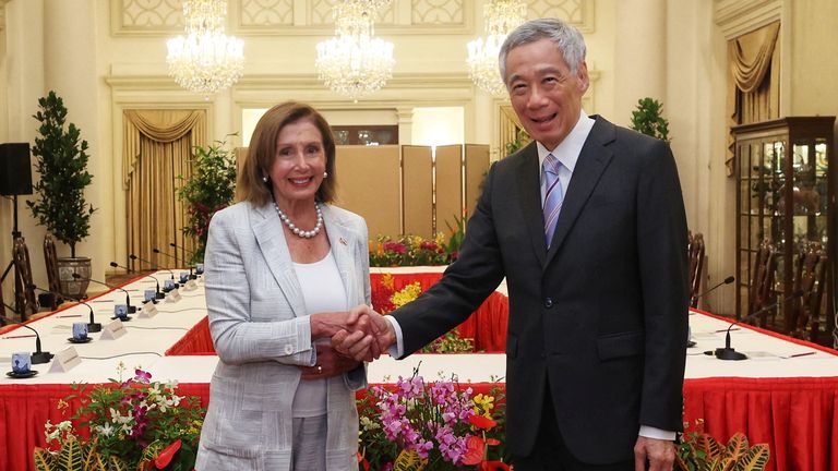 U.S. House of Representatives Speaker Nancy Pelosi shakes hands with Singapore&#39;s Prime Minister Lee Hsien Loong in Singapore August 1, 2022. Mohd Fyrol Official Photographer/Ministry of Communications and Information/Handout via REUTERS ATTENTION EDITORS - THIS IMAGE HAS BEEN SUPPLIED BY A THIRD PARTY. NO RESALES. NO ARCHIVES.

