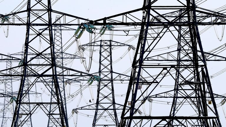 Electricity pylons carry power away from Dungeness nuclear power station in Kent as the National Grid warned that a record low demand for electricity during the UK&#39;s coronavirus lockdown could lead to windfarms and power plants being turned off to avoid overloading the electricity grid.