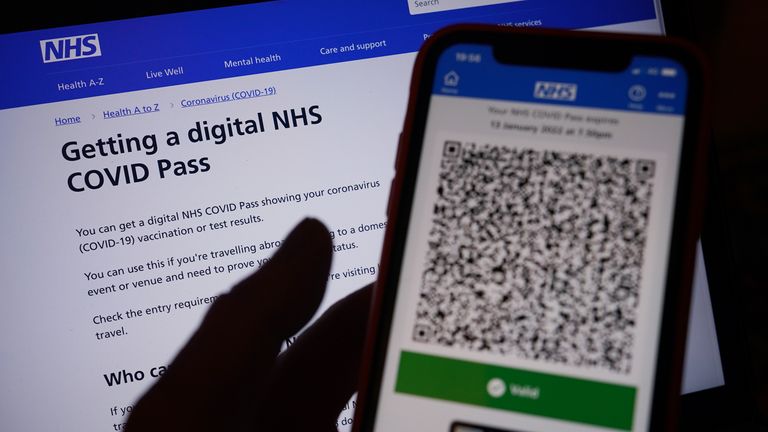 A person&#39;s NHS COVID domestic Pass is displayed on a smartphone screen within the NHS App, as new restrictions will come into force to slow the spread of the Omicron variant of coronavirus from tomorrow. Picture date: Tuesday December 14, 2021.
Read less