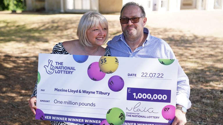 NHS worker Maxine Lloyd and her fiance Wayne Tilbury, from Kettering, celebrate her £1 million win on one of the National Lottery&#39;s instant win games at Barton Hall Hotel in Kettering, Northamptonshire, which became a double-celebration when she received the all-clear for breast cancer a few days later. Picture date: Tuesday August 9, 2022.
