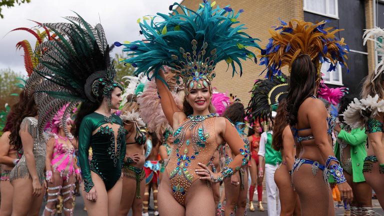 Revellers take part in the Notting Hill Carnival in London, Britain, August 29, 2022. REUTERS/Maja Smiejkowska
