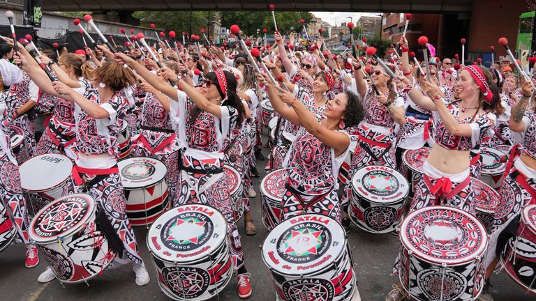 Revellers take part in the Notting Hill Carnival in London, Britain, August 29, 2022. REUTERS/Maja Smiejkowska
