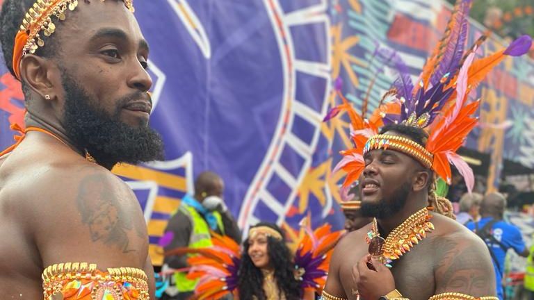 People enjoying the Notting Hill Festival in London