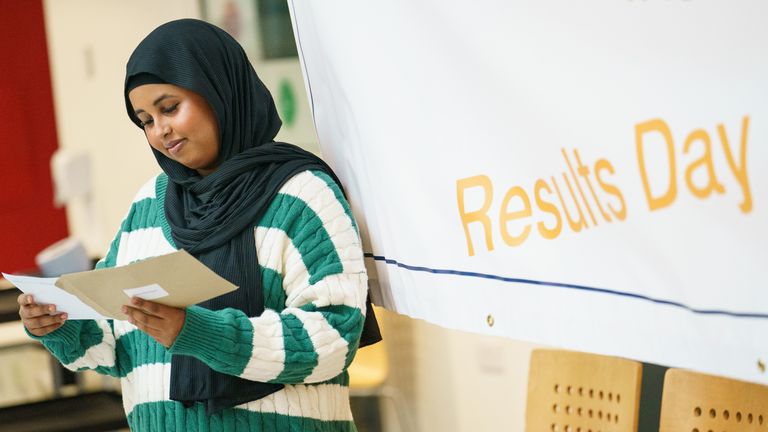 Naima Mohamoud receives her A-level results at Oasis Academy Hadley, Enfield, north London. Picture date: Thursday August 18, 2022.

