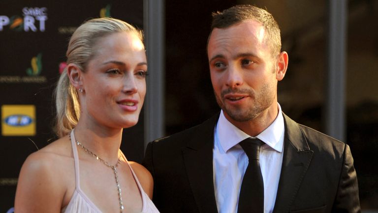     FILE PHOTO November 4, 2012 South African Olympians Oscar Pistorius and Reba Steenkamp arrive at the awards ceremony in Johannesburg, South Africa