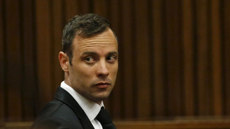 Oscar Pistorius sits in the dock at the North Gauteng High Court in Pretoria, South Africa for a bail hearing, December 8, 2015. REUTERS/Siphiwe Sibeko
