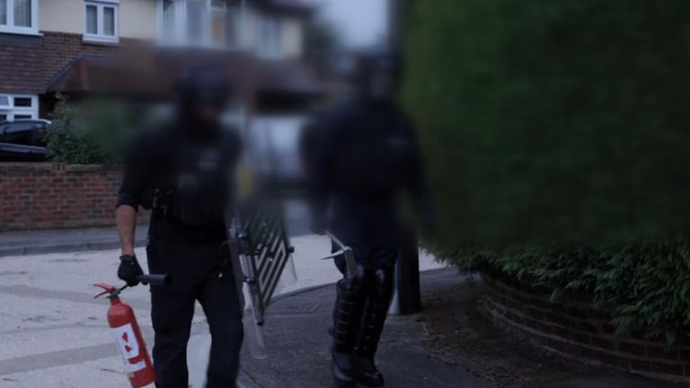 Police raid in Surrey