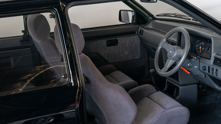 The interior of the 1985 Ford Escort RS Turbo previously owned by Diana, Princess of Wales, on display at the Silverstone Race Circuit near Towcester, Northamptonshire, before it goes under the hammer on Saturday at Silverstone Classics. Picture date: Friday August 26, 2022.

