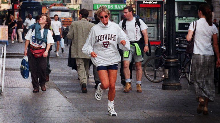 Diana, Princess of Wales goes unoticed by passers-by as she sprints to her car today (Thursday) after leaving a gym in Earls Court, west London.