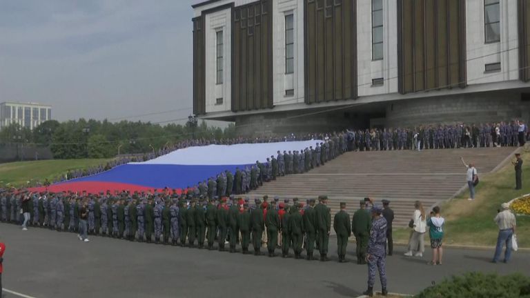 The largest national flag in Russia with a surface of 10,000 square meters (107,000 square feet) is unfolded in Moscow.