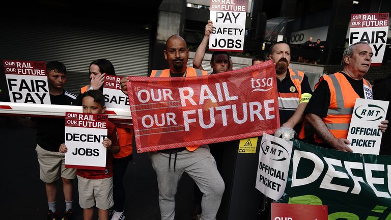 Members of the Transport Salaried Staffs&#39; Association (TSSA) and the Rail, Maritime and Transport union (RMT) are joined by their families on the picket line outside London Euston train station as members of both unions take part in a fresh strike over jobs, pay and conditions. Picture date: Wednesday July 27, 2022.