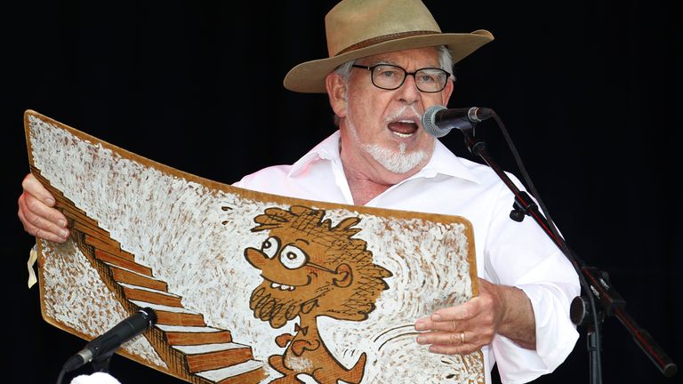 Australian singer Rolf Harris performs with his wobbleboard at the Glastonbury Festival 2010 in south west England, June 25, 2010.   REUTERS/Luke MacGregor (BRITAIN - Tags: ENTERTAINMENT SOCIETY)