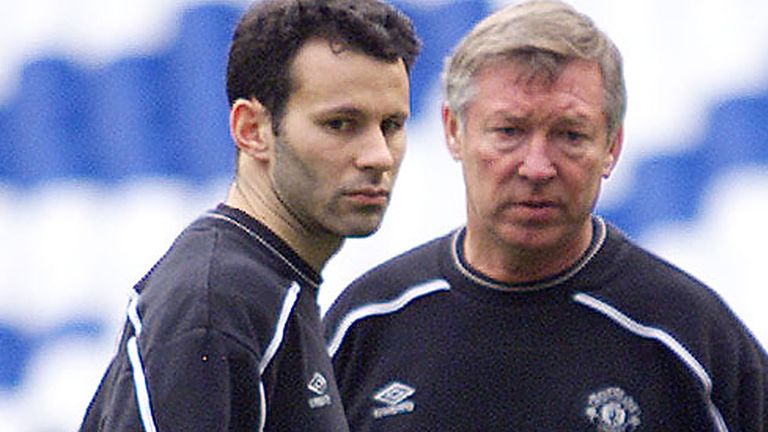 Manchester United&#39;s Ryan Giggs (L) talks to team manager Sir Alex Ferguson (C) and physiotherapist Robert Swire at the Bernabeu stadium in Madrid April 3. Giggs has been suffering from a hamstring injury. Manchester United will play Real Madrid in the Champions League quarter-final round first leg tommorrow.

DC