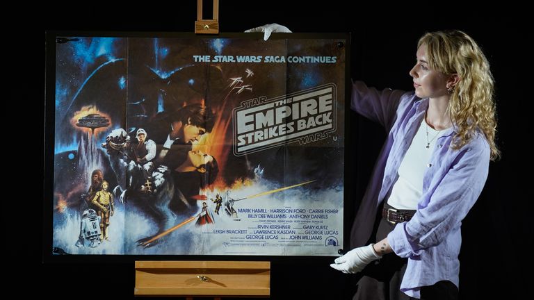 UK Quad &#39;Gone with the Wind&#39; benignant   poster from the 1980 movie  Star Wars - The Empire Strikes Back (estimate - £8,000 - 10,000) during a preview for their forthcoming poster auction