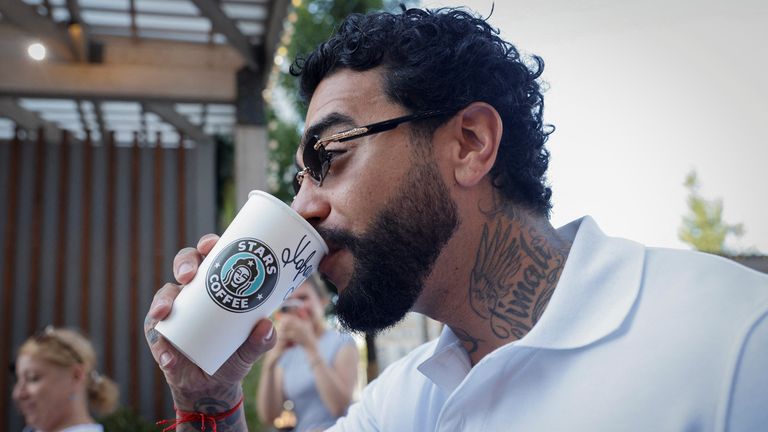 Rapper Timati, co-owner of the new coffee shop "Stars Coffee", which opens following Starbucks Corp company&#39;s exit from the Russian market, drinks a coffee, in Moscow, Russia August 18, 2022. REUTERS/Maxim Shemetov
