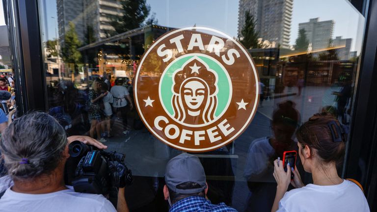 People gather at a Stars Coffee cafe in Moscow