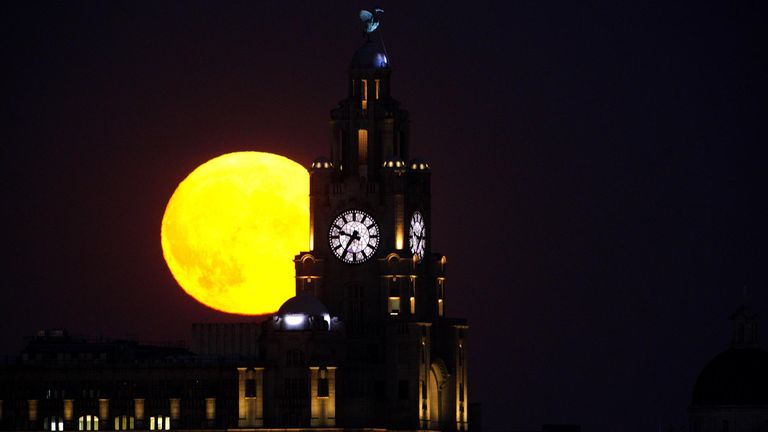 The Sturgeon supermoon, the final supermoon of the year, rises over the Royal Liver Building in Liverpool. Picture date: Thursday August 11, 2022.