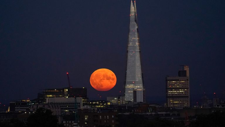 The Super Moon rises behind The Shard, in London, Thursday, Aug. 11, 2022. (AP Photo/Alberto Pezzali)
PIC::AP