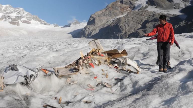 Melting glaciers reveal plane debris.