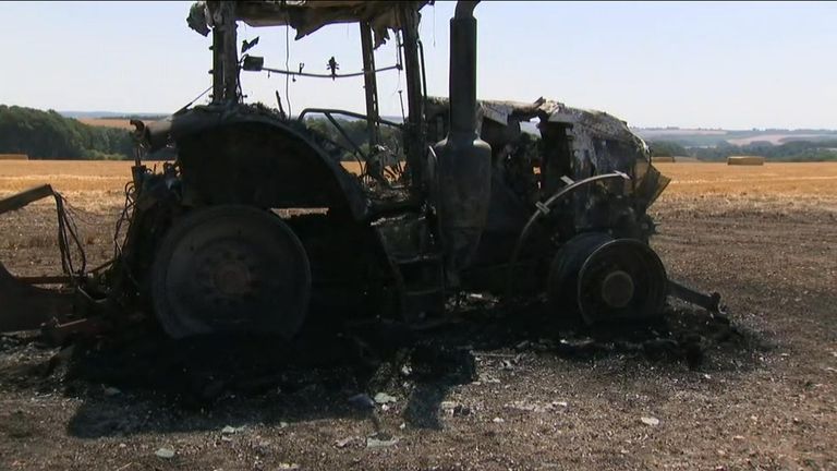 A burned-out tractor on a farm in Wiltshire, destroyed by a wildfire