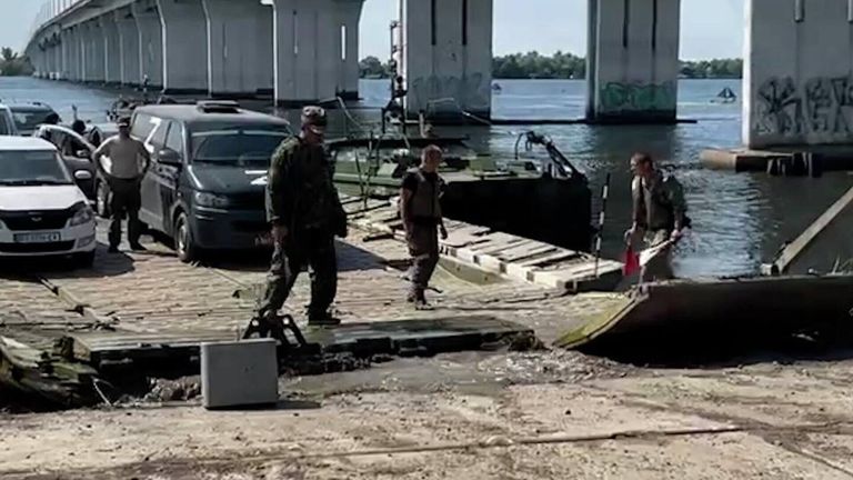 The makeshift pontoon crossing constructed by the Russians to traverse the river after the Ukrainians blew the bridges