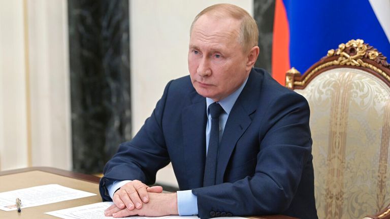 Putin attends a virtual conference call at the Kremlin this week. Pic: AP