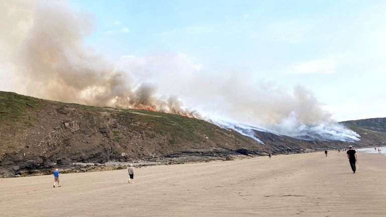 A grass fire by Newgale Beach, Pembrokeshire, as a drought has been declared for parts of England following the driest summer for 50 years. Picture date: Sunday August 14, 2022.