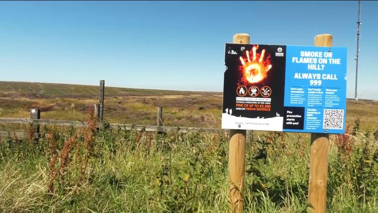 A sign on the moors in Yorkshire warns of the risk of wildfires during the UK&#39;s latest heatwave.