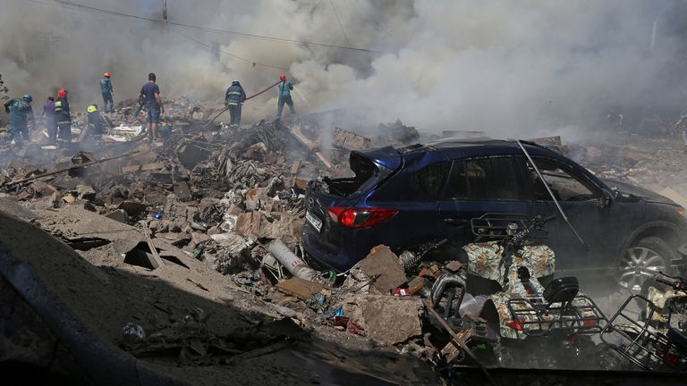 Firefighters extinguish a fire after an explosion tore through a fireworks warehouse in a shopping mall in Yerevan, Armenia August 14, 2022. Vahram Baghdasaryan / Photolure via REUTERS ATTENTION EDITORS - THIS IMAGE HAS BEEN A THIRD PARTY PROVIDED.