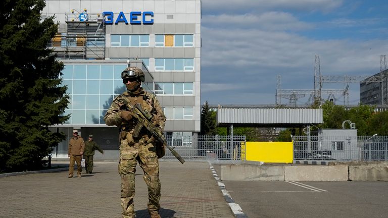 FILE - A Russian serviceman stands guard in an area of the Zaporizhzhia Nuclear Power Station in territory under Russian military control, southeastern Ukraine, on May 1, 2022. The Zaporizhzhia plant is in southern Ukraine, near the town of Enerhodar on the banks of the Dnieper River. It is one of the 10 biggest nuclear plants in the world. Russia and Ukraine have accused each other of shelling Europe&#39;s largest nuclear power plant, stoking international fears of a catastrophe on the continent.  This photo was taken during a trip organized by the Russian Ministry of Defense. (AP Photo, File)
