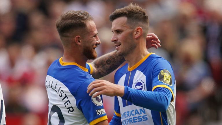Brighton&#39;s Pascal Gross celebrates with his team-mate Alexis Mac Allister after scoring his opening goal against Manchester United