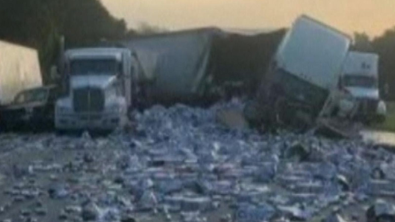 Beer and concrete strewn over road after lorry crash in Florida US