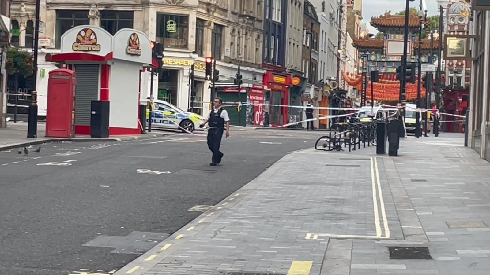 Two police officers taken to hospital after being stabbed near ...