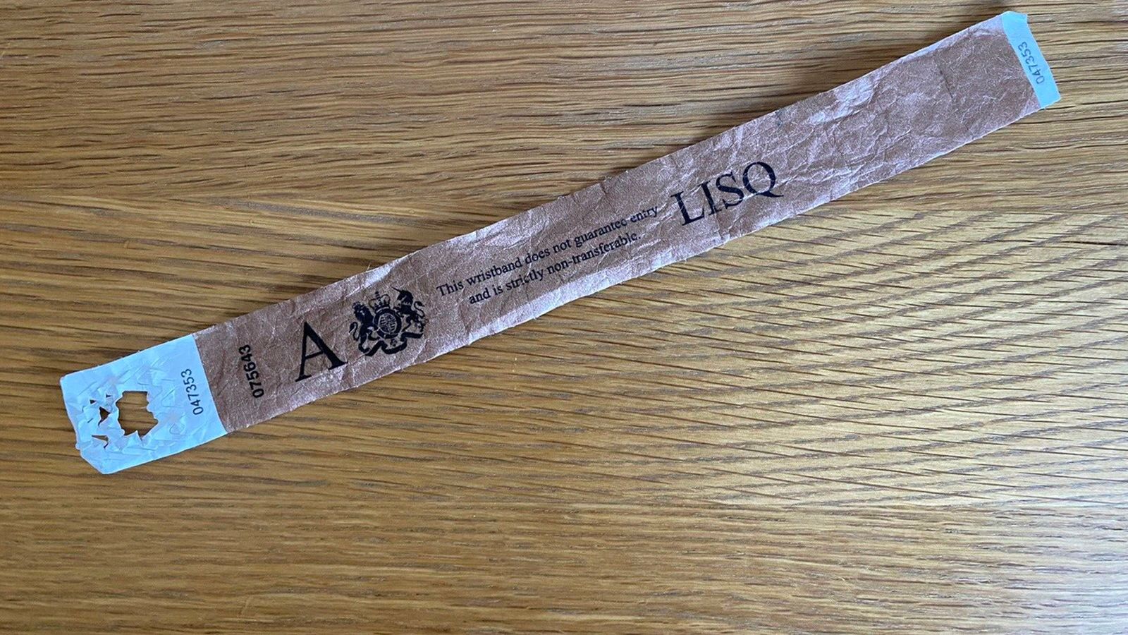 eBay bans sale of wristbands from Queen's lying in state queue after