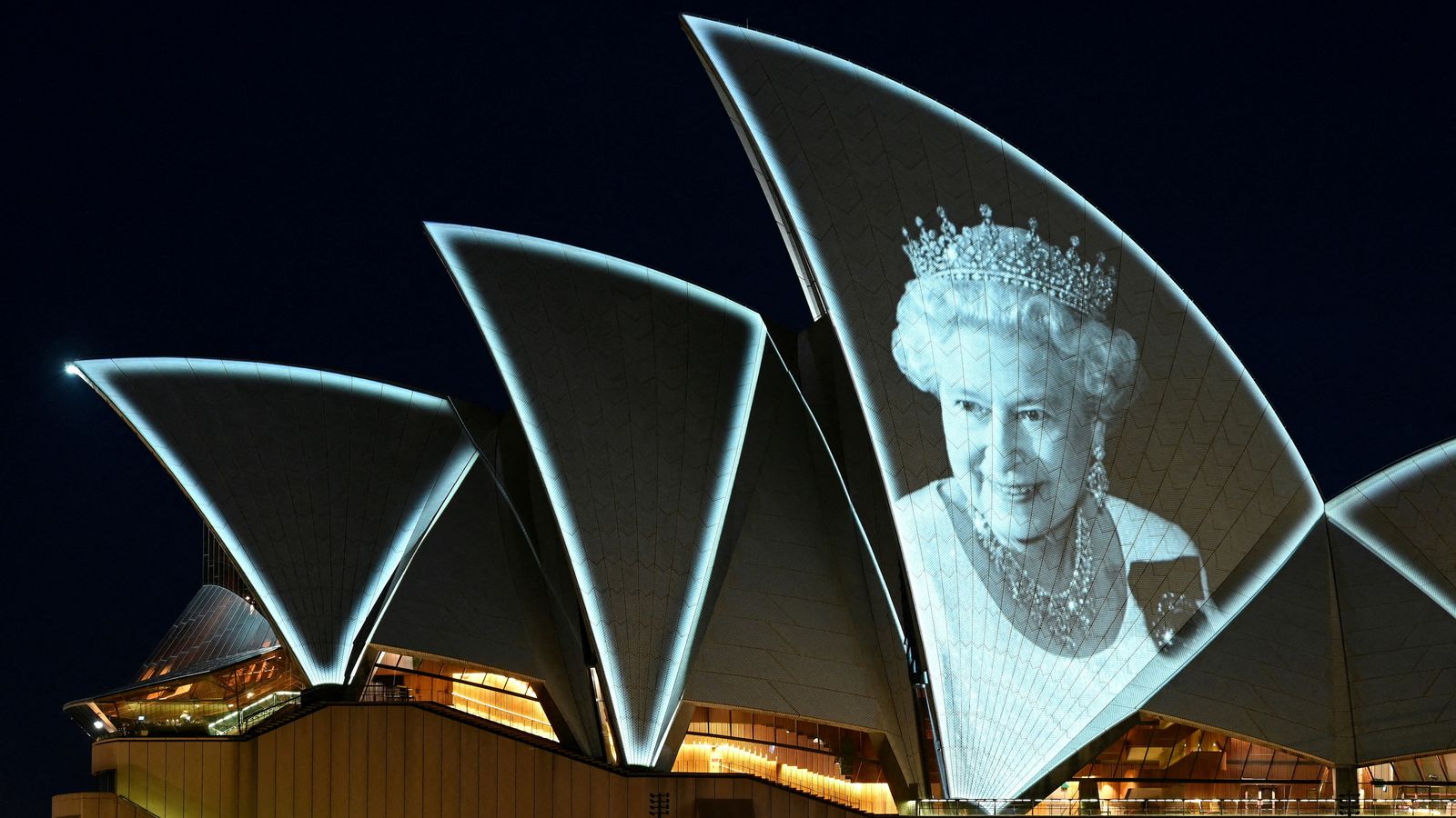 Images of the Queen projected into the night sky in Switzerland in