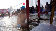 A swimmer competes in a pool carved from thick ice covering the Songhua River during the Harbin Ice Swimming Competition, in the northern city of Harbin, Heilongjiang province, China January 5, 2020. REUTERS/Aly Song