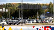 Cars queue to cross the border from Russia to Finland at the Nuijamaa border check point in Lappeenranta, Finland, Thursday, Sept. 22, 2022. (Lauri Heino/Lehtikuva via AP)