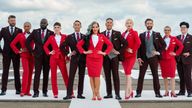 Virgin Atlantic of Michelle Visage (centre) with others modelling the Virgin Atlantic uniform options for the launch of the airline&#39;s updated gender identity policy, giving its LGBTQ plus people the option to choose which uniform best represents them