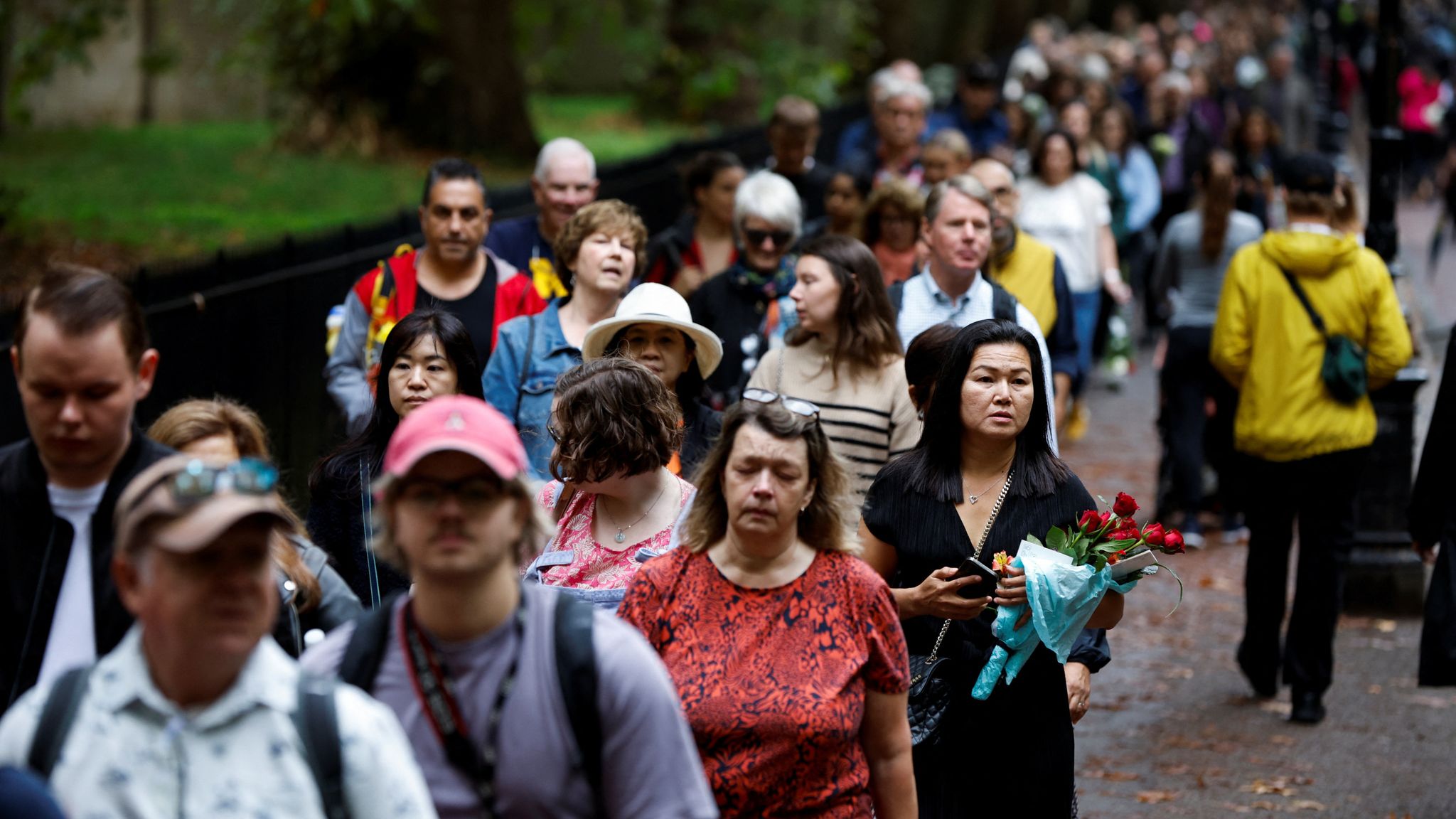 Thousands gather at Buckingham Palace to honour Queen as lucky few