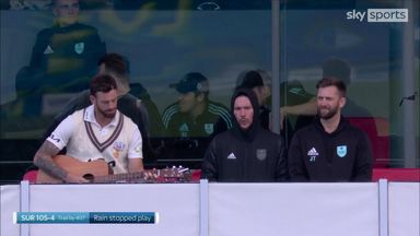 Surrey players keep themselves entertained during rain delay