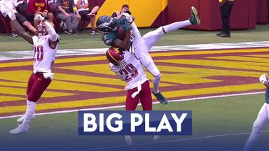 Smith makes miraculous leaping 44-yard catch between two defenders!