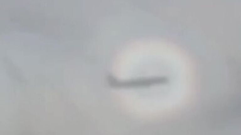A rare phenomenon is filmed from plane in Portland, Oregon. The shadow surrounded by a full ring rainbow is a rare occurrence observed at high altitudes.