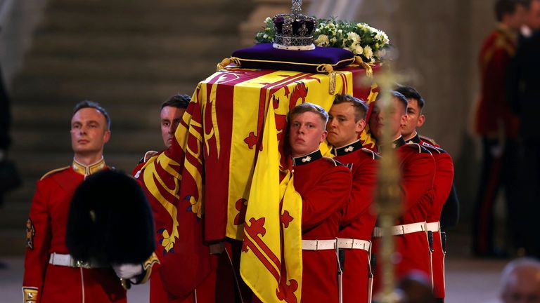 The Imperial State Crown is seen on the coffin carrying Queen Elizabeth II into Westminster Hall for the Lying in State at the Palace of Westminster in London, Wednesday, Sept. 14, 2022. (Dan Kitwood/Pool via AP)