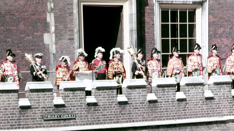 Garter King of Arms Sir George Bellew reads the first and principal proclamation of the accession of Queen Elizabeth II, from the balcony overlooking Friary Court, St James&#39;s Palace.
