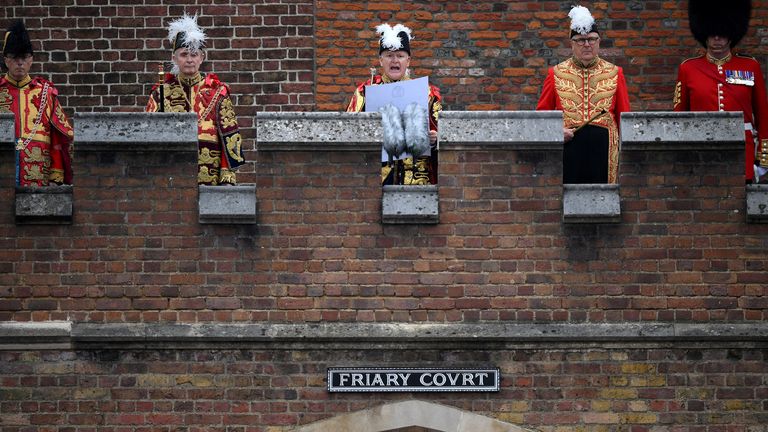Garter Principal King of Arms, David Vines White, reads the Principal Proclamation from the balcony over Friary Court at St James&#39;s Palace