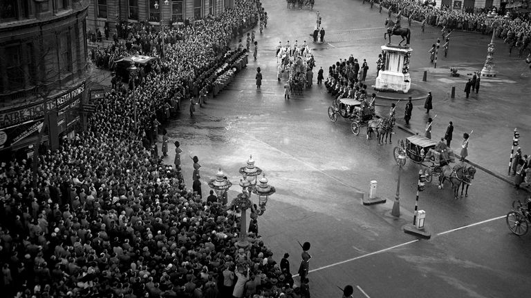 AGB Russell, the Lancaster Herald, rises in his open carriage to proclaim Queen Elizabeth II. The accession was proclaimed in traditional ceremonies at four points in London, by Officers of Arms.

