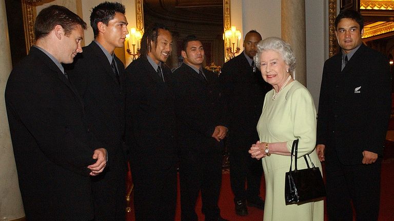 Queen Elizabeth II meets members of the New Zealand All Blacks rugby team at Buckingham Palace, London.